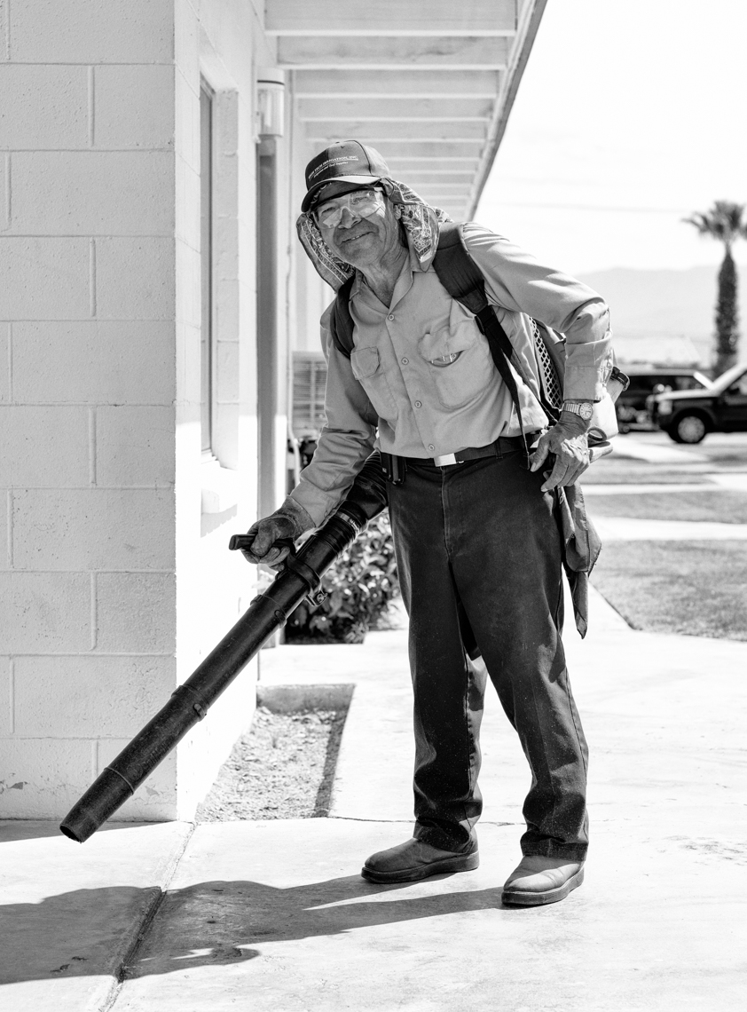 Gardener operating a leaf blower in Indio, CA.