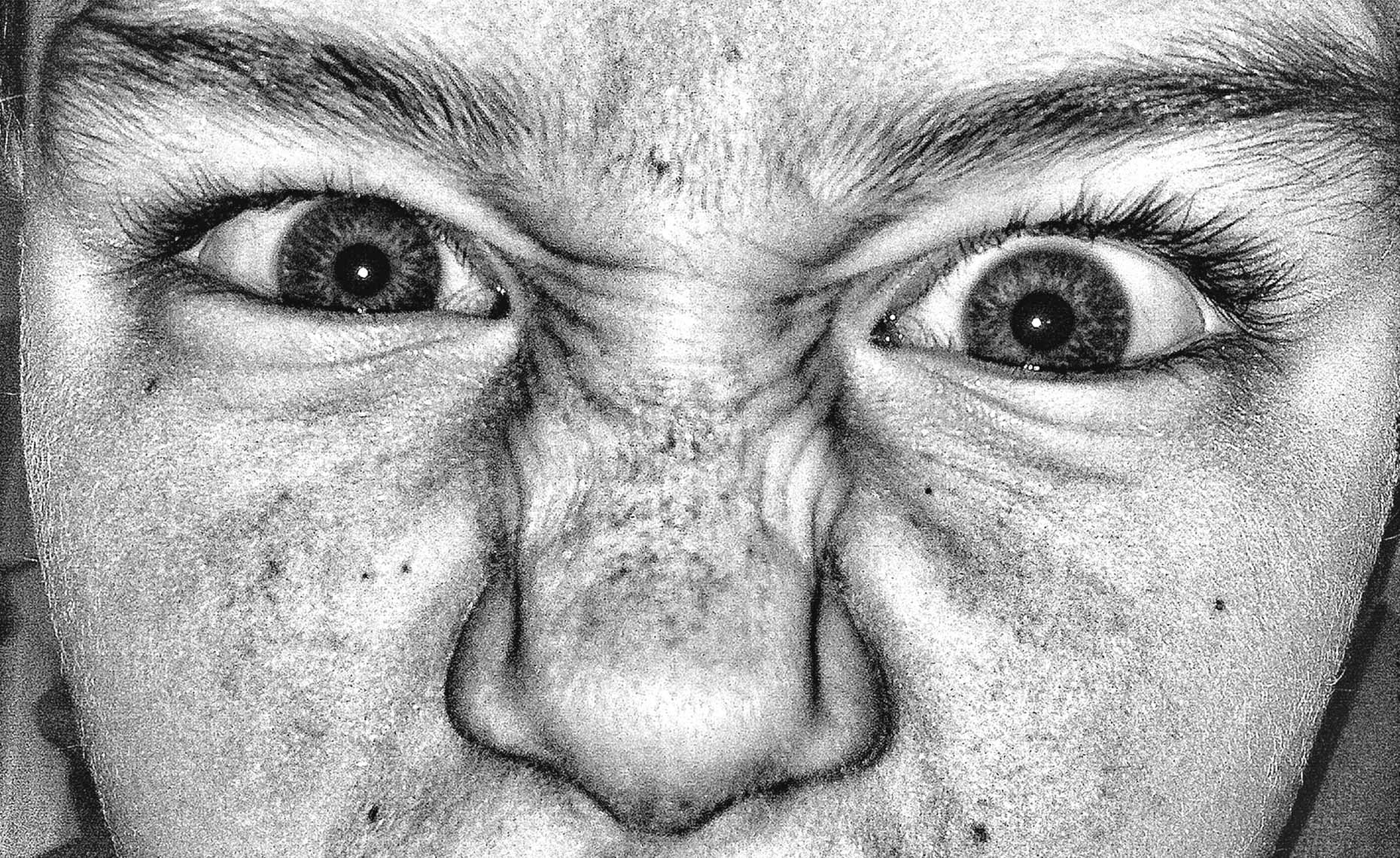 Extreme black and white close up of a boy