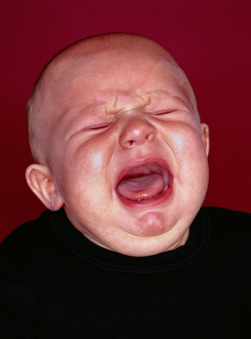 Close up of a crying baby (4-8 months old).